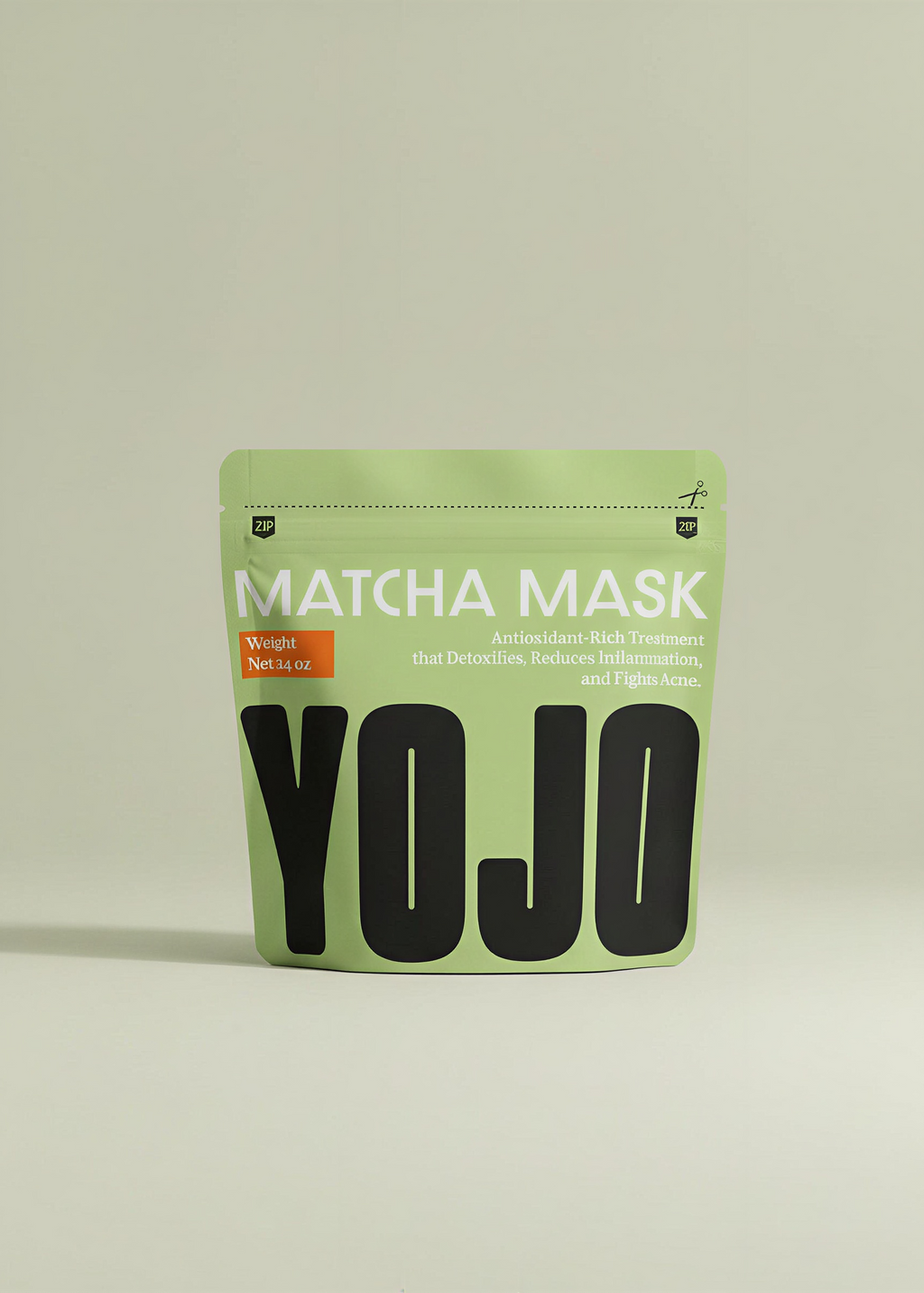 Green package of YOJO Matcha Mask on a beige background